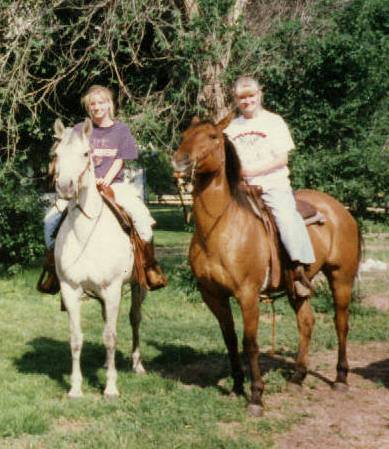 Kokomo and Gunner, packing guests on our ranch