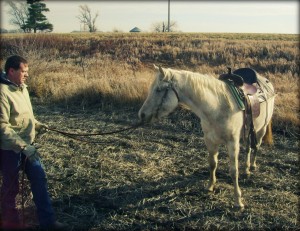 Cowboy Dad Catching His Horse