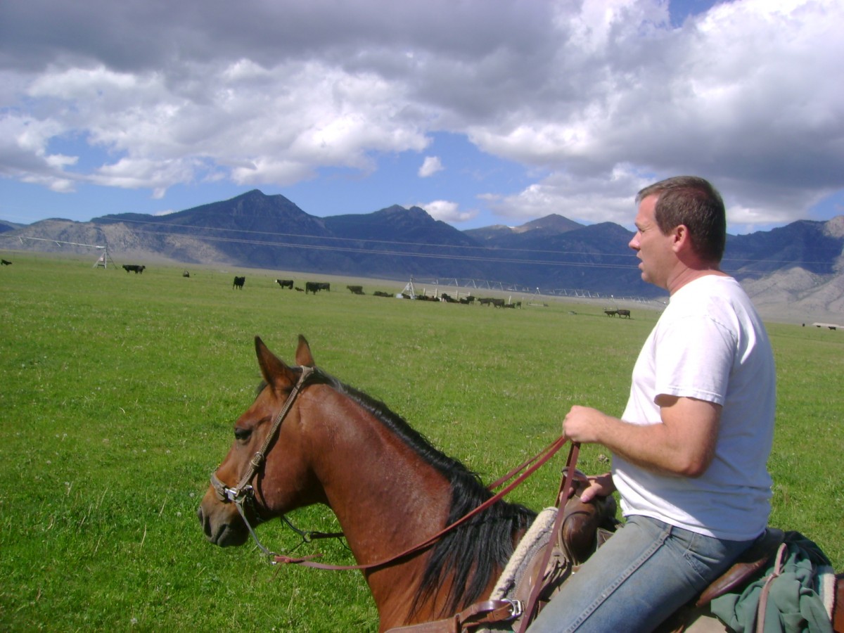 Cowboy Dad riding Red