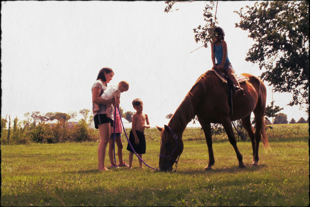 Daisy Giving Kids Horseback Rides